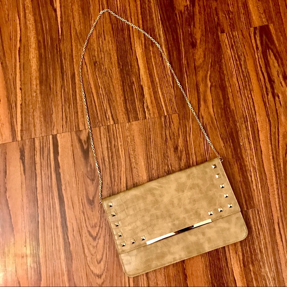 Tan faux animal skin purse with gold detail